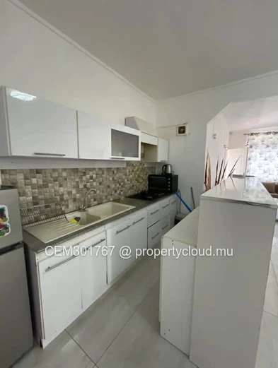 Tastefully furnished 3-bedroom ground floor apartment in the heart of Pereybere